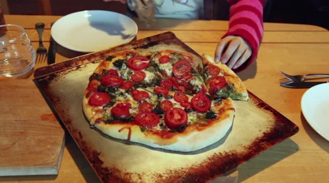 Slicing a homemade pizza Stock Footage 45500013