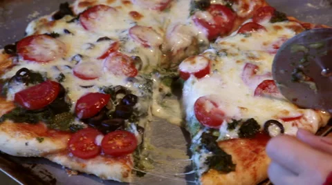 Slicing a homemade pizza Stock Footage 45500330
