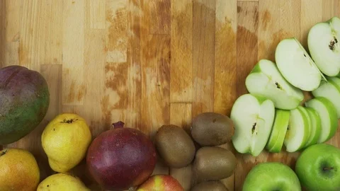 Slicing kiwifruit with a knife Stock Footage 78488384