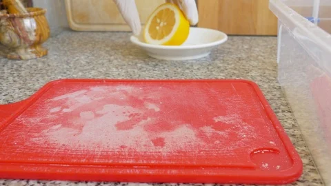 Slicing of lemon, close up Stock Footage 104883531