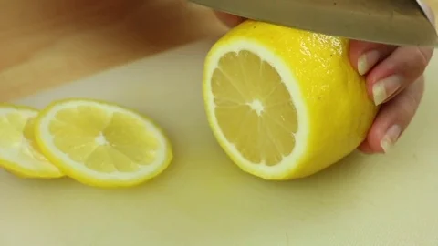 Slicing lemon Stock Footage 78145547