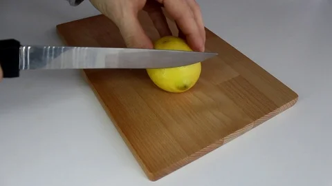 Slicing lemon Stock Footage 86250921