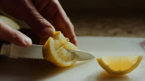 Slicing Lemon - Slow Motion 4K Stock Footage 128844810