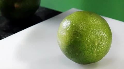 Slicing a lime Stock Footage 8573817