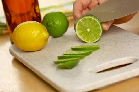 Slicing a Lime Foto stock
