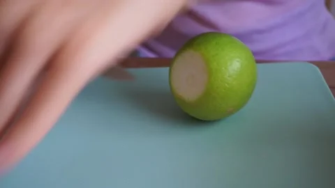 Slicing limes Stock Footage 136472259