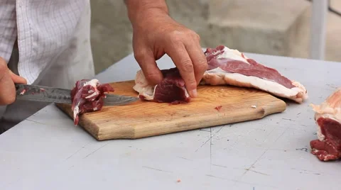 Slicing meat Stock Footage 41595465