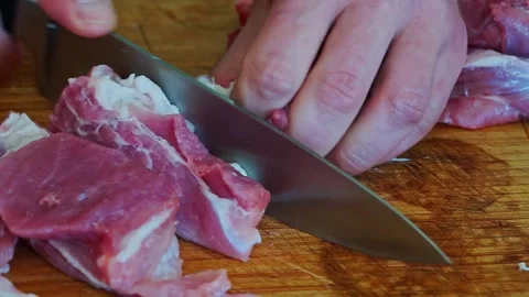 Slicing meat Stock Footage 154341876