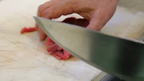 Slicing Meat In Restaurant 02 Stock Footage 87064308