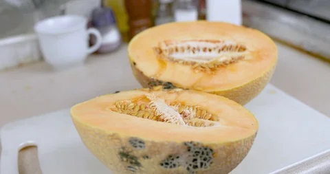 Slicing of the melon with knife Stock Footage 114379585