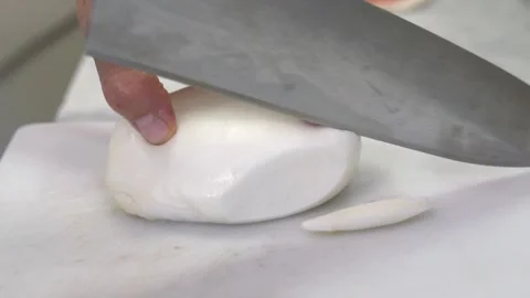Slicing mozzarella cheese Video stock 141281148