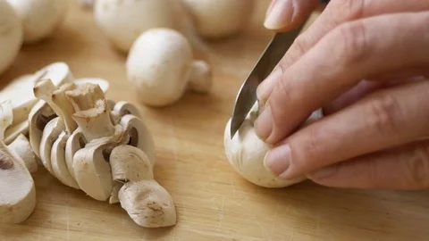 Slicing mushrooms Stock Footage 70282576