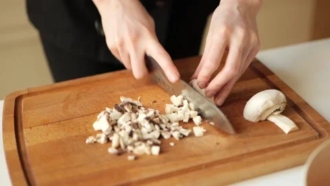 Slicing mushrooms. Stock Footage 203896395