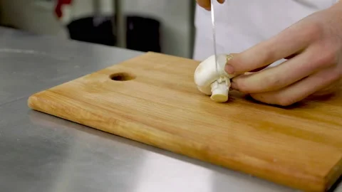 Slicing mushrooms with a knife Stock-Footage 150874076