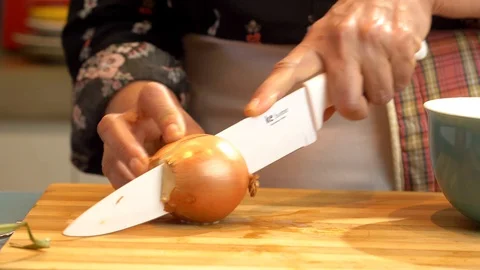 Slicing Onion in Half Stock Footage 127933137