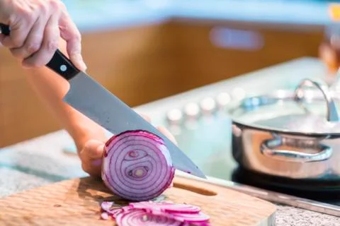 Slicing onion Stock Photos