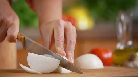 Slicing onion in slow motion Stock Footage 52913528