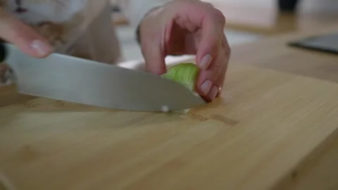 Slicing onions on a cutting board. Stock Footage 276294350