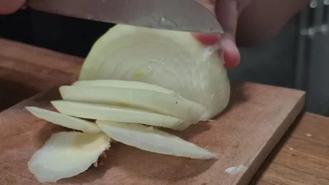 Slicing onions with a knife Stock Footage 309157885