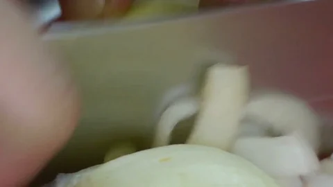 Slicing Onions  Large Knife Stock Footage 78594193