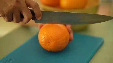 Slicing the Orange 2 Stock Footage 260628948