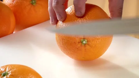 Slicing an orange Stock Footage 8573800