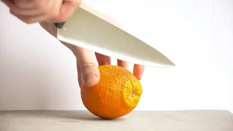 Slicing orange Stock Footage 129767800
