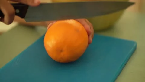Slicing the Orange Stock Footage 260628935