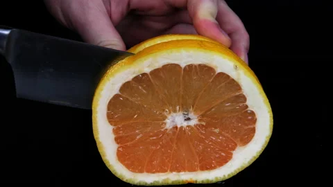 Slicing an orange into slices 스톡 동영상 174094339