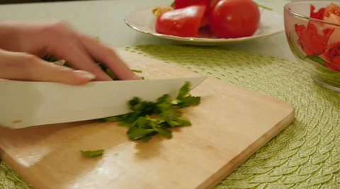 Slicing parsley, dill in the kitchen Stock Footage 36162006