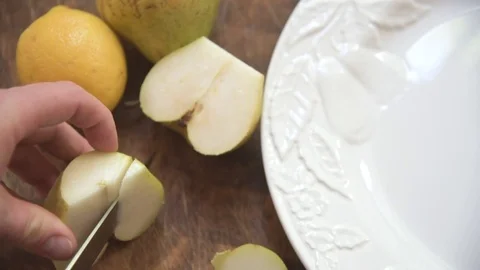 Slicing a pear 스톡 동영상 76889188