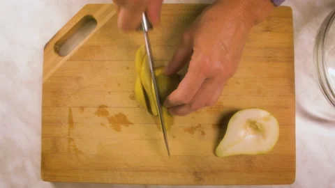 Slicing a pear Stock Footage 162127806