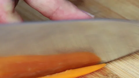 Slicing peppers with a knife Stock Footage 133185017