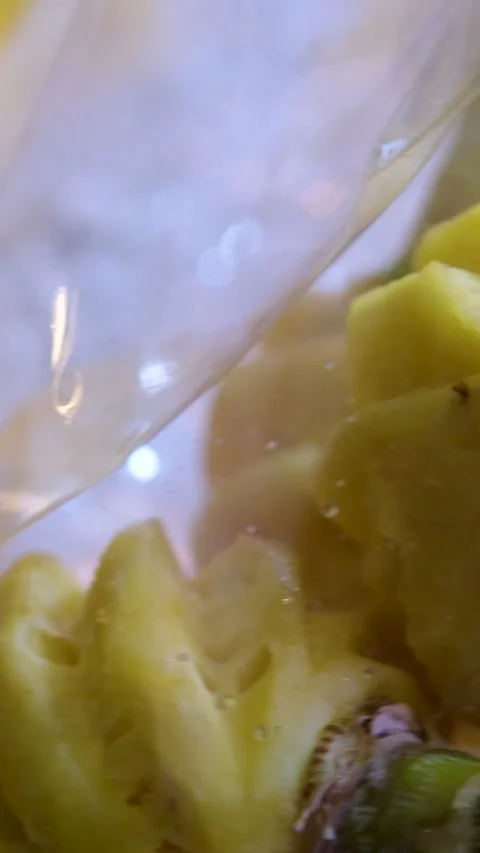 Slicing pineapple in the kitchen. Stock Footage 320675009