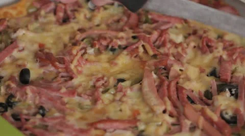 Slicing pizza Stock Footage 12463245
