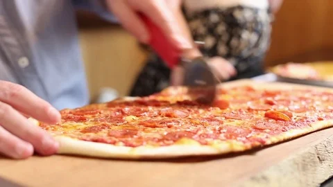 Slicing Pizza Stock Footage 77225708
