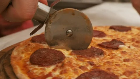 Slicing pizza Stock Footage 102415845