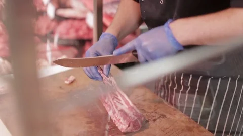 Slicing Pork Ribs Stock Footage 77034281