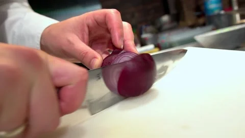 Slicing a Rad Onion. Chef Cuts a Vegetables. Video stock 159508621