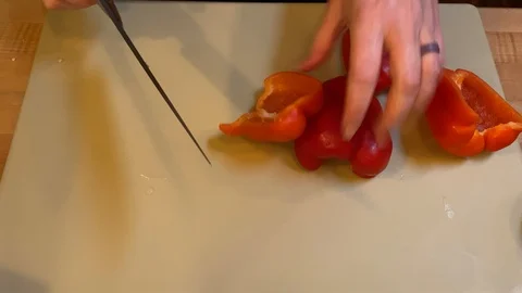 Slicing Red Bell Peppers Stock Footage 122654239