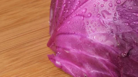 Slicing a red cabbage Video stock 22261633