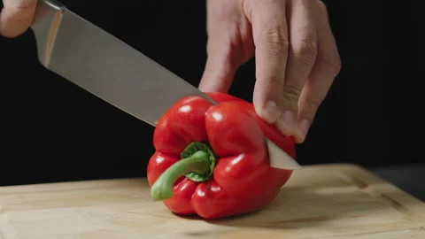 Slicing red pepper Vídeos de archivo 279964580