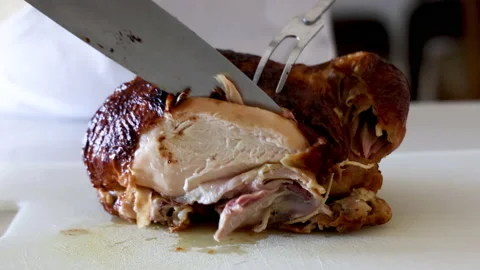 Slicing a Roast Chicken Stock Footage 226815549