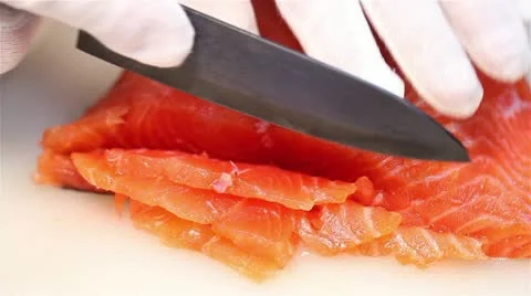Slicing salmon fillets Video stock 21993755