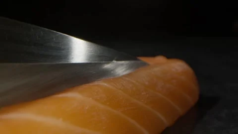 Slicing ​​salmon for rolls Video stock 219842630