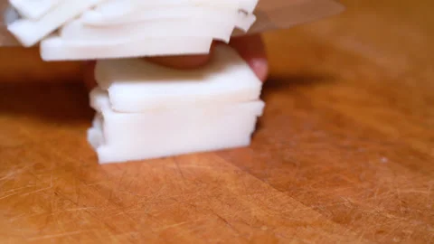 Slicing of salted pork fatback on cutting board, close-up. Stock-Footage 249538091