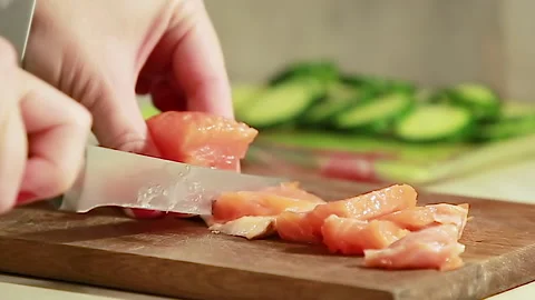 Slicing salted salmon Stock Footage 146035888