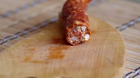 Slicing sausage Stock Footage 50425311