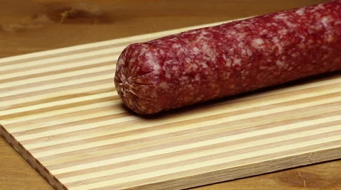 Slicing sausage. Stock Footage 55708858
