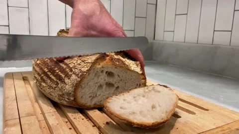 Slicing sourdoughbread 스톡 동영상 143735416